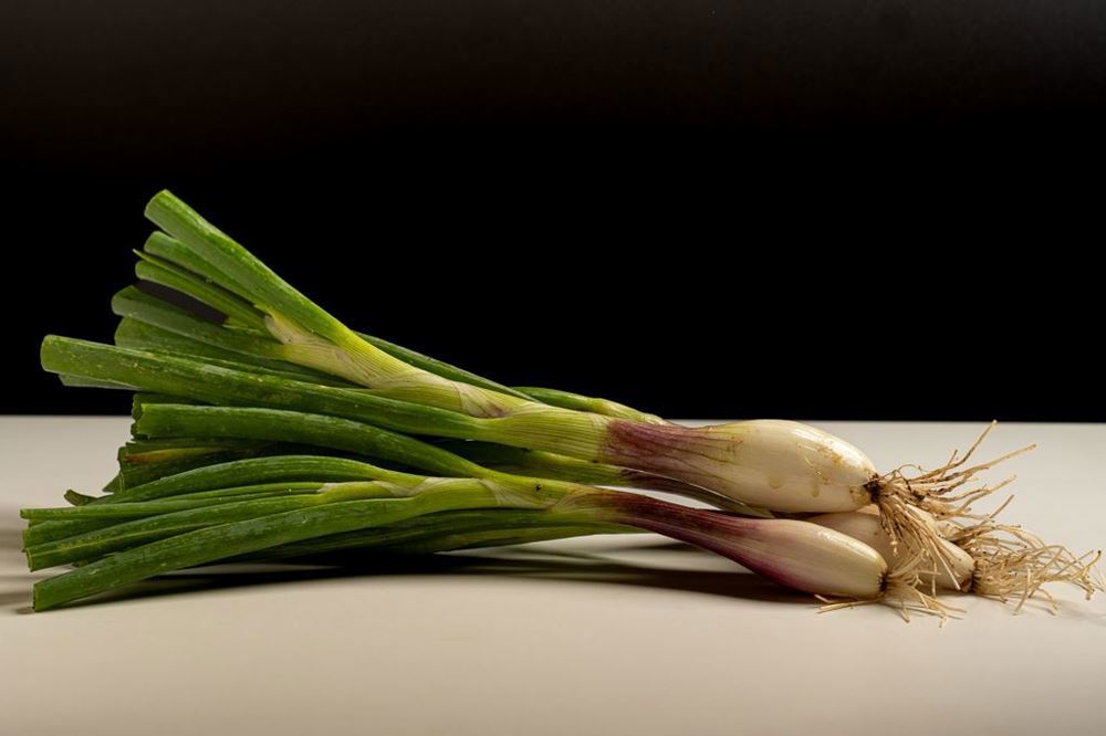 Fresh bunched shallots
