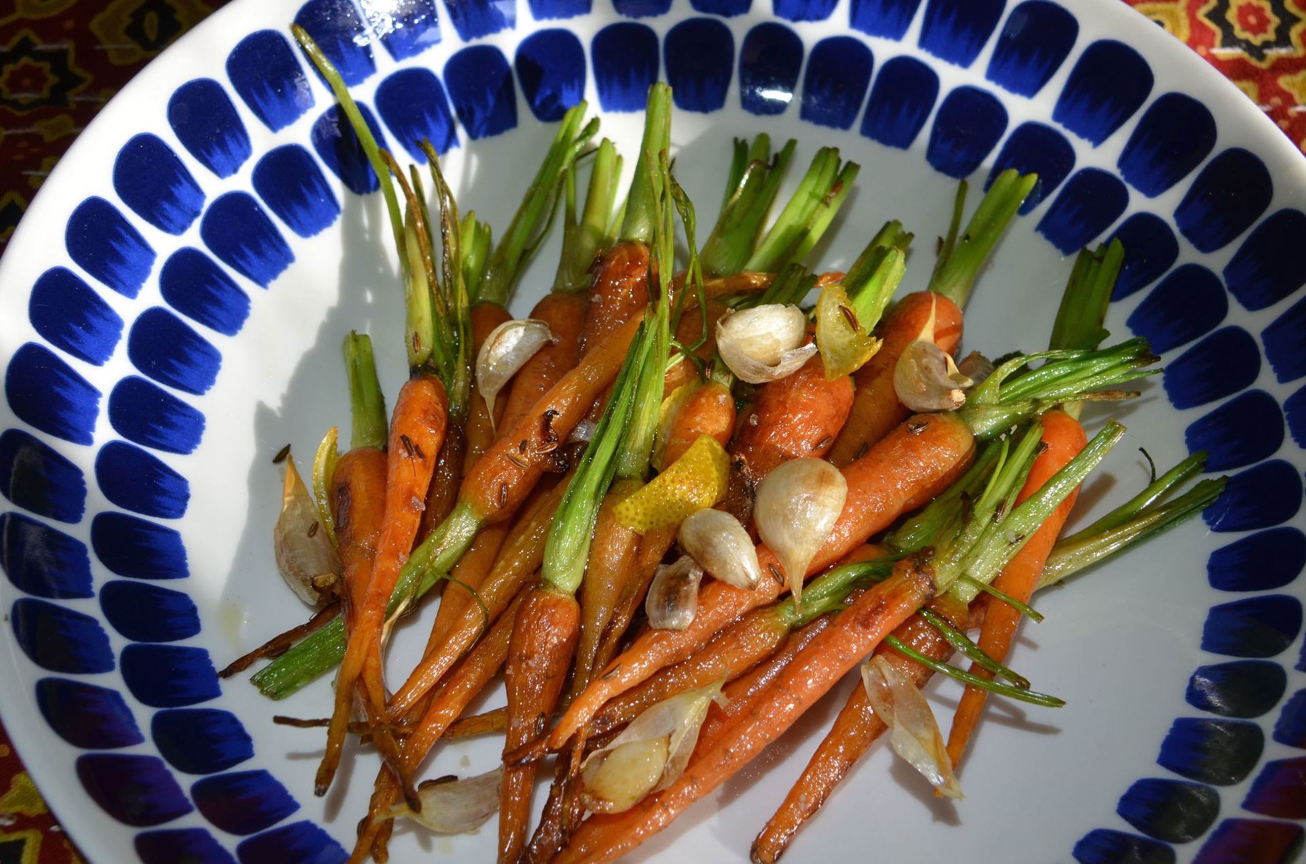 Pan Roasted Baby Carrots with Whole Garlic Cloves, Cumin Seed and Lemon